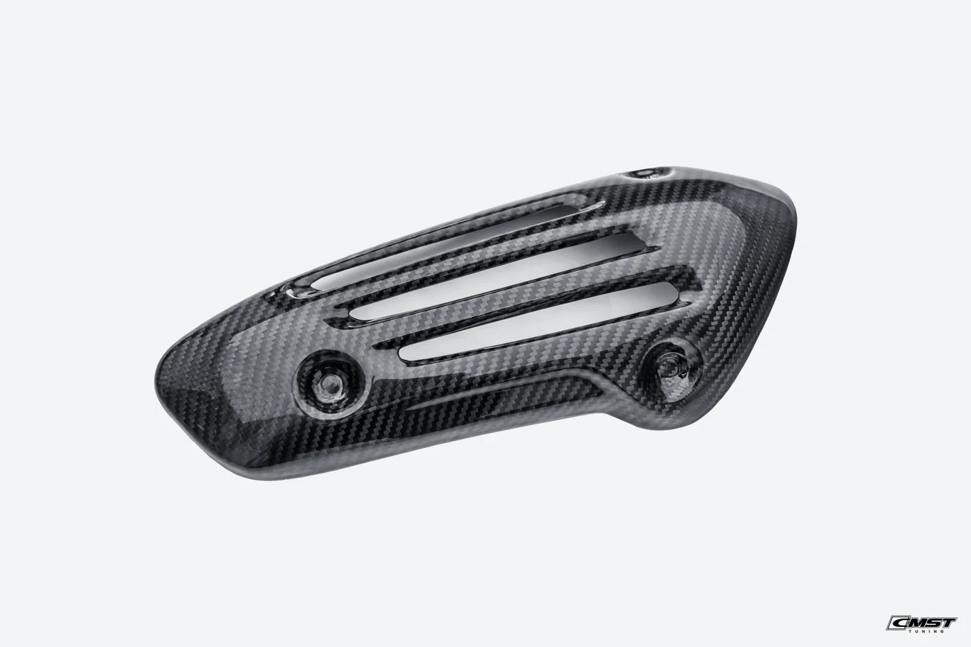A CMST carbon fiber motorcycle component on white