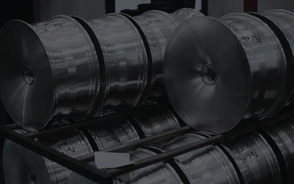Forged aluminum wheel blanks racked at the CMST wheel plant