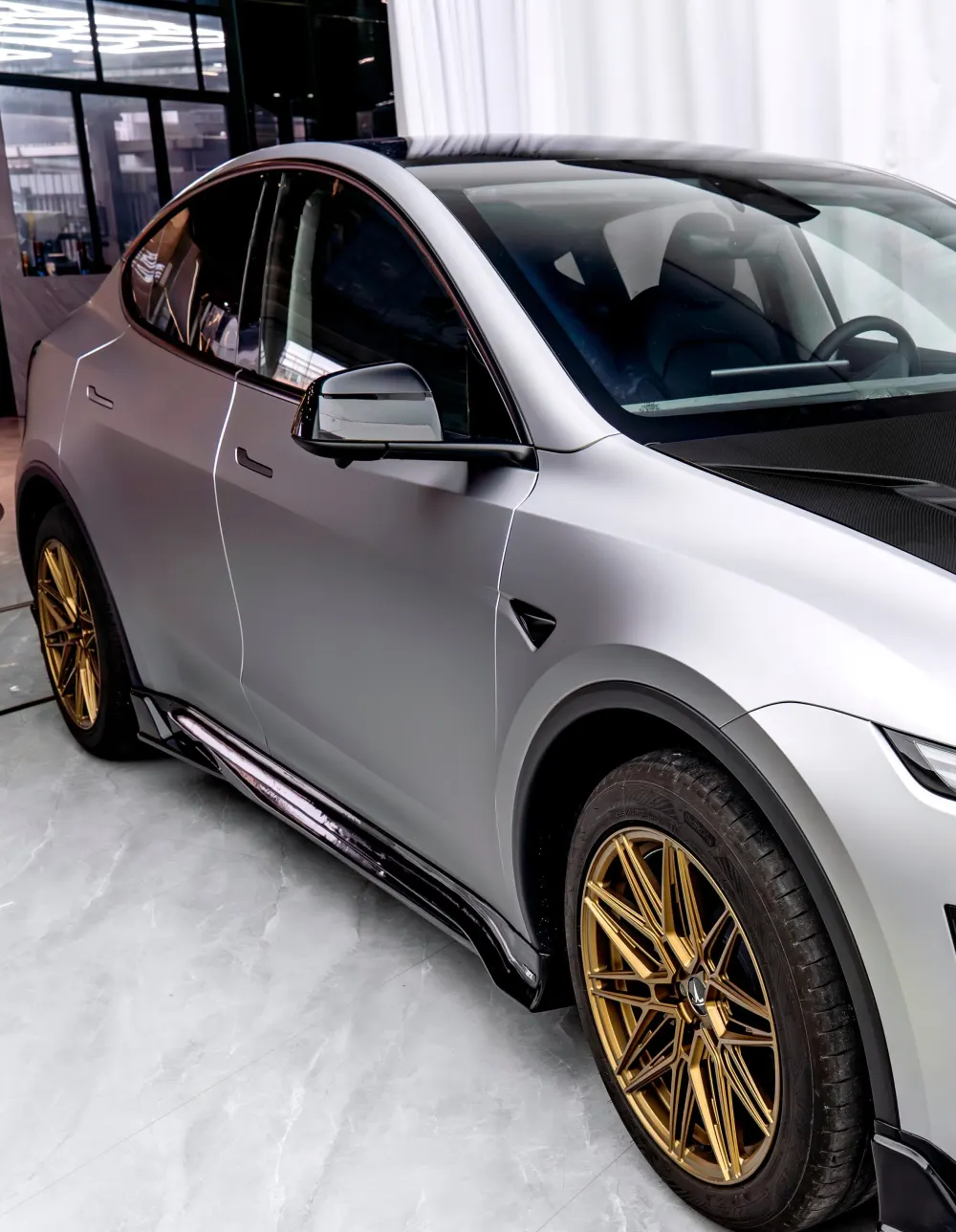 CMST carbon fiber side skirts for the Tesla Model Y